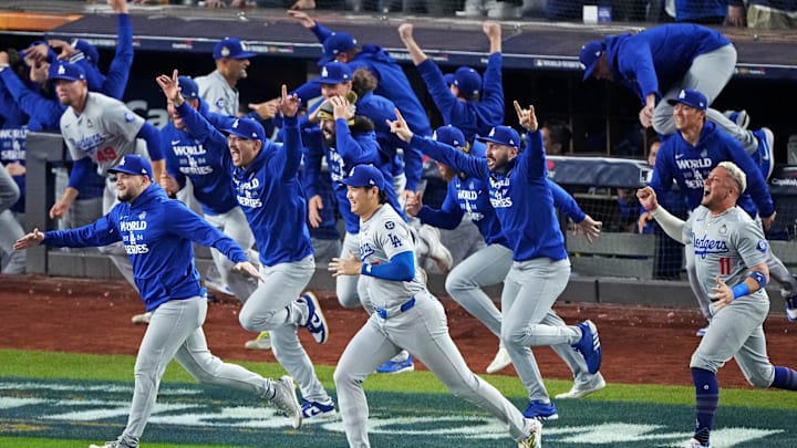 Oct 30, 2024; New York, New York, USA; Los Angeles Dodgers two-way player Shohei Ohtani (17) and the Los Angeles Dodgers celebrate after beating the New York Yankees in game four to win the 2024 MLB World Series at Yankee Stadium. Mandatory Credit: Robert Deutsch-Imagn Images