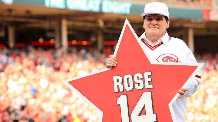 Reds great Pete Rose holds a star bearing his name at Great American Ball Park in 2016.