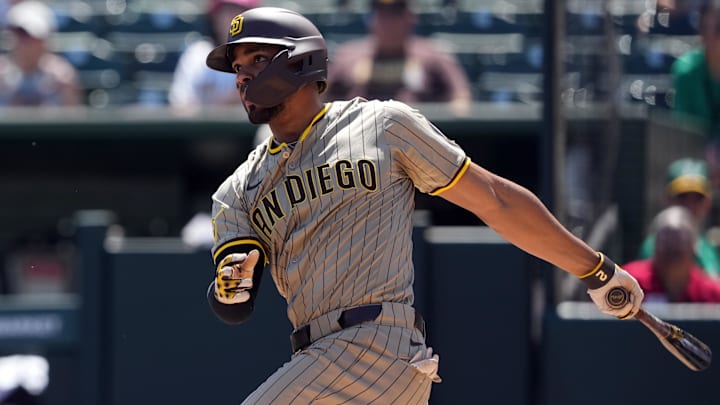Apr 9, 2025; West Sacramento, California, USA; San Diego Padres shortstop Xander Bogaerts (2) hits a double against the Athletics during the first inning at Sutter Health Park. Mandatory Credit: Darren Yamashita-Imagn Images