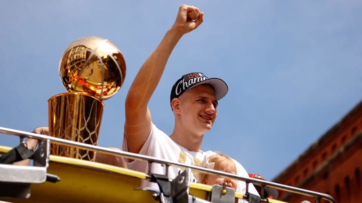Jun 15, 2023; Denver, CO, USA; Denver Nuggets center Nikola Jokic gestures to the crowd during the championship parade after the Denver Nuggets won the 2023 NBA Finals. 