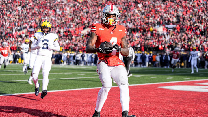 Ohio State wide receiver Jeremiah Smith makes a catch for a touchdown against Michigan during the first half at Ohio Stadium in Columbus, Ohio on Saturday, Nov. 30, 2024.