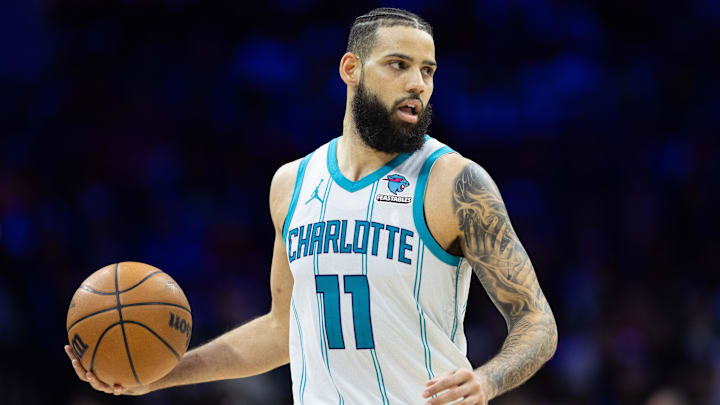 Mar 1, 2024; Philadelphia, Pennsylvania, USA; Charlotte Hornets forward Cody Martin (11) controls the ball against the Philadelphia 76ers during the fourth quarter at Wells Fargo Center. Mandatory Credit: Bill Streicher-Imagn Images