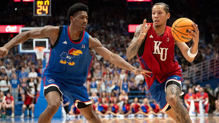 Kansas University’s Tre White (3) drives to the basket during Late Night in the Phog, Friday, Oct. 17, 2025 at Allen Fieldhouse .