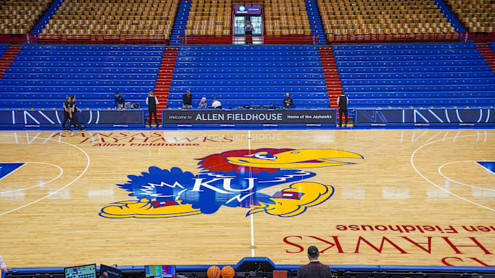 Dec 31, 2022; Lawrence, Kansas, USA; A general view of the center court logo prior to a game between the Kansas Jayhawks and Oklahoma State Cowboys at Allen Fieldhouse. Mandatory Credit: Denny Medley-Imagn Images Dec 31, 2022; Lawrence, Kansas, USA; A general view of the center court logo prior to a game between the Kansas Jayhawks and Oklahoma State Cowboys at Allen Fieldhouse. Mandatory Credit: Denny Medley-Imagn Images