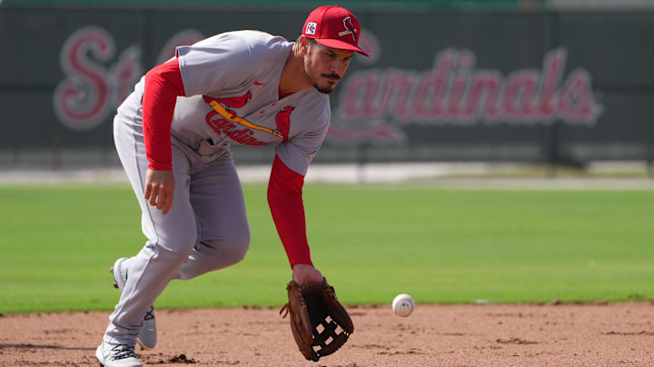 Feb 17, 2025; Jupiter, FL, USA; St. Louis Cardinals third base Nolan Arenado (28) takes infield practice at spring training Feb 17, 2025; Jupiter, FL, USA; St. Louis Cardinals third base Nolan Arenado (28) takes infield practice at spring training