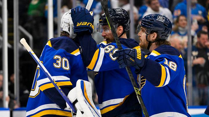Nov 29, 2025; St. Louis, Missouri, USA; St. Louis Blues goaltender Joel Hofer (30) celebrates with left wing Pavel Buchnevich (89) and center Robert Thomas (18) after the Blues defeated the Utah Mammoth at Enterprise Center. Mandatory Credit: Jeff Curry-Imagn Images Nov 29, 2025; St. Louis, Missouri, USA; St. Louis Blues goaltender Joel Hofer (30) celebrates with left wing Pavel Buchnevich (89) and center Robert Thomas (18) after the Blues defeated the Utah Mammoth at Enterprise Center. Mandatory Credit: Jeff Curry-Imagn Images