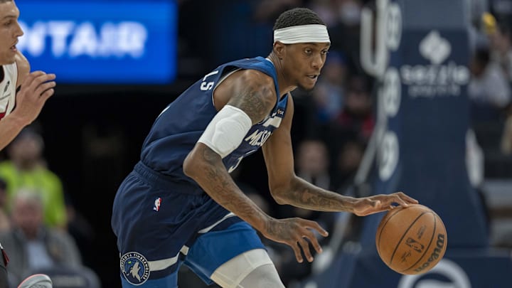 Minnesota Timberwolves forward Jaden McDaniels dribbles the ball down the court against the Miami Heat in the first half at Target Center in Minneapolis on Nov. 10, 2024.