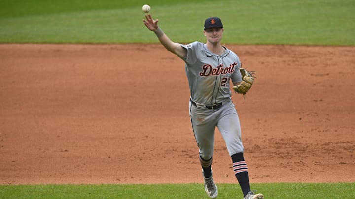 Oct 12, 2024; Cleveland, Ohio, USA; Detroit Tigers shortstop Trey Sweeney (27) throws to first base in the seventh inning against the Cleveland Guardians during game five of the ALDS for the 2024 MLB Playoffs at Progressive Field. 