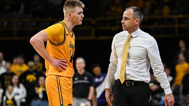 Feb 8, 2026; Iowa City, Iowa, USA; Iowa Hawkeyes guard Bennett Stirtz (14) and head coach Ben McCollum talk during the second half against the Northwestern Wildcats at Carver-Hawkeye Arena. Mandatory Credit: Jeffrey Becker-Imagn Images Feb 8, 2026; Iowa City, Iowa, USA; Iowa Hawkeyes guard Bennett Stirtz (14) and head coach Ben McCollum talk during the second half against the Northwestern Wildcats at Carver-Hawkeye Arena. Mandatory Credit: Jeffrey Becker-Imagn Images