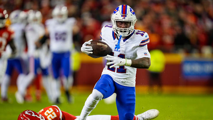 Dec 10, 2023; Kansas City, Missouri, USA; Buffalo Bills wide receiver Deonte Harty (11) runs with the ball against Kansas City Chiefs cornerback Trent McDuffie (22) during the second half at GEHA Field at Arrowhead Stadium. Mandatory Credit: Jay Biggerstaff-USA TODAY Sports