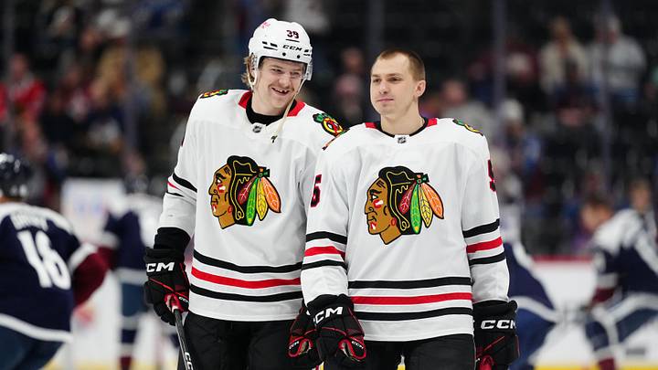 Mar 10, 2025; Denver, Colorado, USA; Chicago Blackhawks defenseman Ethan Del Mastro (38) and defenseman Artyom Levshunov (55) before the game against the Colorado Avalanche at Ball Arena. Mandatory Credit: Ron Chenoy-Imagn Images
