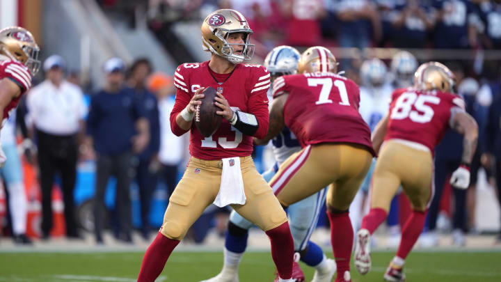 Oct 8, 2023; Santa Clara, California, USA; San Francisco 49ers quarterback Brock Purdy (13) prepares to pass against the Dallas Cowboys during the first quarter at Levi's Stadium. Mandatory Credit: Darren Yamashita-USA TODAY Sports