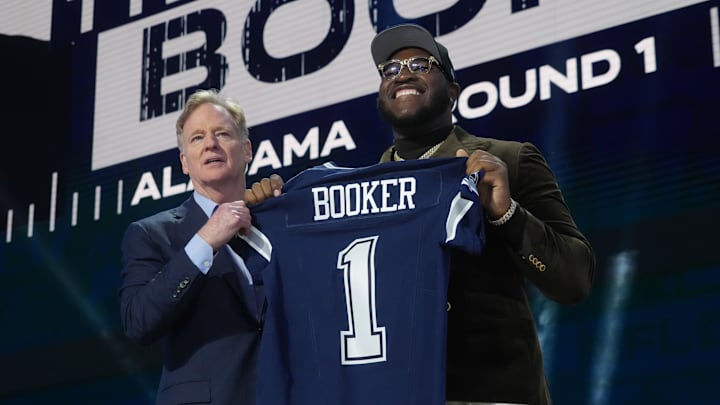 Apr 24, 2025; Green Bay, WI, USA; NFL commissioner Roger Goodell with Alabama Crimson Tide offensive lineman Tyler Booker after he is selected by the Dallas Cowboys as the number twelve pick in the first round of the 2025 NFL Draft at Lambeau Field. Mandatory Credit: Kirby Lee-Imagn Images