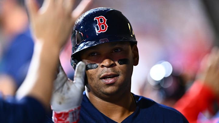 May 6, 2023; Philadelphia, Pennsylvania, USA; Boston Red Sox third baseman Rafael Devers (11) celebrates in the dugout after scoring against the Philadelphia Phillies in the fourth inning at Citizens Bank Park.