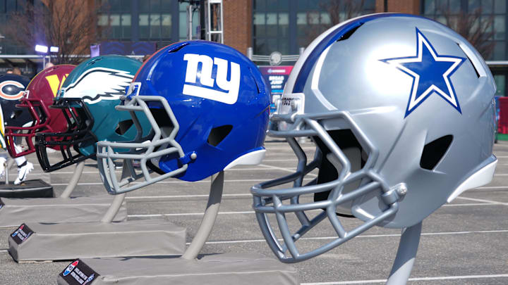 Feb 27, 2025; Indianapolis, IN, USA; NFC East helmets of the Dallas Cowboys, New York Giants, Philadelphia Eagles and Washington Commanders at the 2025 NFL Scouting Combine Experience at Lucas Oil Stadium. Mandatory Credit: Kirby Lee-Imagn Images Feb 27, 2025; Indianapolis, IN, USA; NFC East helmets of the Dallas Cowboys, New York Giants, Philadelphia Eagles and Washington Commanders at the 2025 NFL Scouting Combine Experience at Lucas Oil Stadium. Mandatory Credit: Kirby Lee-Imagn Images