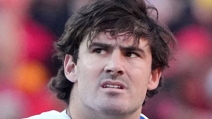 Indianapolis Colts quarterback Daniel Jones looks at the scoreboard