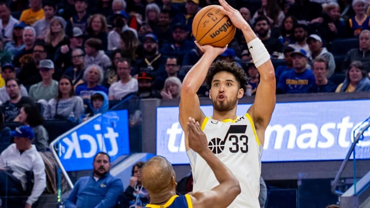 Apr 7, 2024; San Francisco, California, USA;  Utah Jazz guard Johnny Juzang (33) shoots a 3-pointer against the Warriors. 