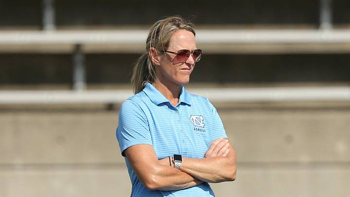 May 25, 2018; Stony Brook, NY, USA; North Carolina head coach Jenny Levy watches her team warmup before todays game against James Madison at Kenneth P LaValle Stadium. Mandatory Credit: Chris Bergmann-Imagn Images May 25, 2018; Stony Brook, NY, USA; North Carolina head coach Jenny Levy watches her team warmup before todays game against James Madison at Kenneth P LaValle Stadium. Mandatory Credit: Chris Bergmann-Imagn Images