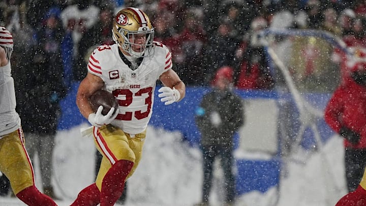 49ers Christian McCaffrey carries the ball for several yards during first half action of their home game against the San Francisco 49ers in Orchard Park on Dec. 1, 2024.