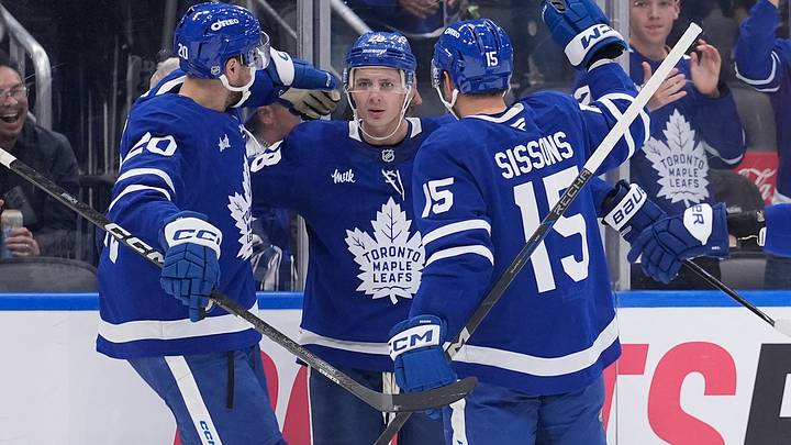 Oct 17, 2026; Toronto, Ontario, CAN; Toronto Maple Leafs forward Nicholas Paul (20) and center Colton Sissons (15) congratulate defenseman Troy Stecher (28) on his goal against the New York Islanders during the third period at Scotiabank Arena. Mandatory Credit: John E. Sokolowski-Imagn Images Oct 17, 2026; Toronto, Ontario, CAN; Toronto Maple Leafs forward Nicholas Paul (20) and center Colton Sissons (15) congratulate defenseman Troy Stecher (28) on his goal against the New York Islanders during the third period at Scotiabank Arena. Mandatory Credit: John E. Sokolowski-Imagn Images