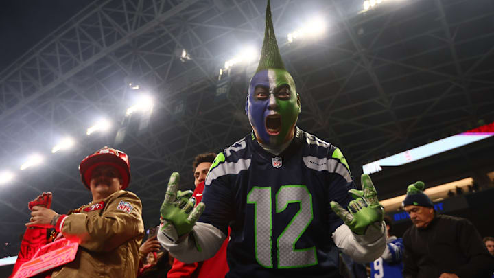 Jan 17, 2026; Seattle, WA, USA; A Seattle Seahawk fan celebrates following an NFC Divisional Round game between the Seattle Seahawks and the San Francisco 49ers at Lumen Field. 