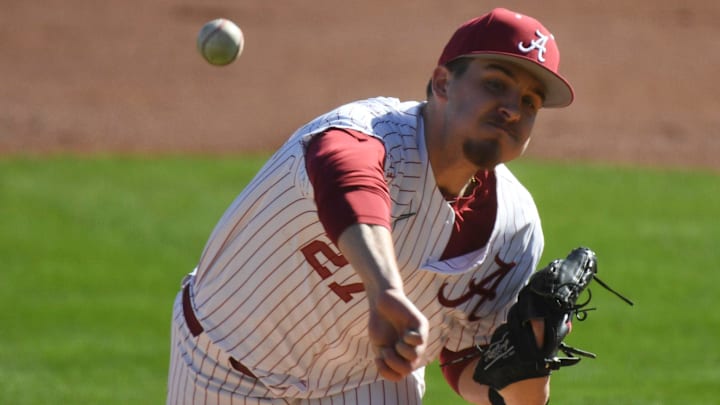 Feb 18, 2023; Bessemer, AL, USA;  Alabama pitcher Ben Hess (27) delivers a pitch as the Crimson Tide faced Richmond in the season-opening series.

Sports Alabama Vs Richmond College Baseball