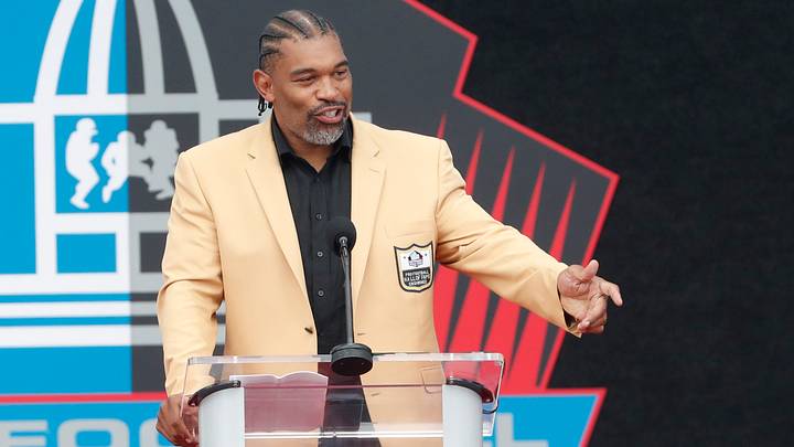 Aug 3, 2024; Canton, OH, USA;  Class of 2024 member Julius Peppers during his acceptance speech into the Pro Football Hall of Fame at the enshrinement ceremony at Tom Benson Hall of Fame Stadium. Mandatory Credit: Charles LeClaire-USA TODAY Sports