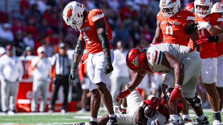 Oct 4, 2025; Tucson, Arizona, USA; Oklahoma State Cowboys outside linebacker Wendell Gregory (4) reacts after he sacked the Arizona Wildcats quarterback during the fourth quarter of the game at Arizona Stadium. Mandatory Credit: Aryanna Frank-Imagn Images