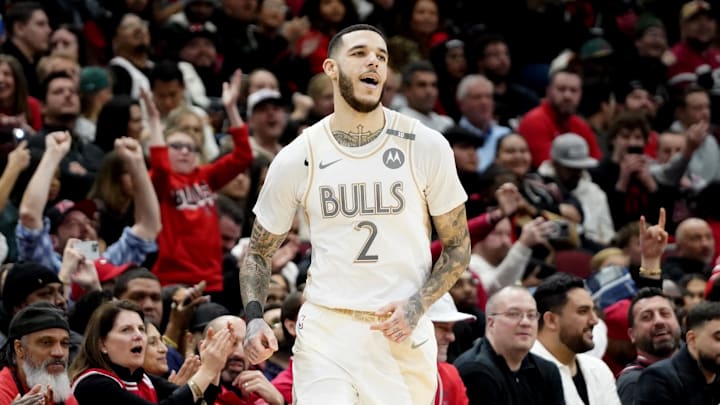 Jan 4, 2025; Chicago, Illinois, USA; Chicago Bulls guard Lonzo Ball (2) reacts after making a three point basket against the New York Knicks during the second half at United Center. Jan 4, 2025; Chicago, Illinois, USA; Chicago Bulls guard Lonzo Ball (2) reacts after making a three point basket against the New York Knicks during the second half at United Center.