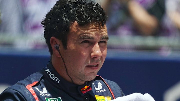 May 4, 2024; Miami Gardens, Florida, USA; Red Bull Racing driver Sergio Perez (11) reacts on the grid after the F1 Sprint Race at Miami International Autodrome. Mandatory Credit: John David Mercer-Imagn Images May 4, 2024; Miami Gardens, Florida, USA; Red Bull Racing driver Sergio Perez (11) reacts on the grid after the F1 Sprint Race at Miami International Autodrome. Mandatory Credit: John David Mercer-Imagn Images