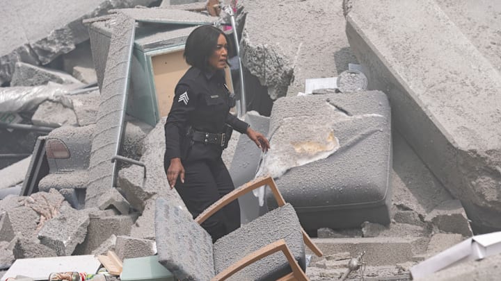 9-1-1 - “Seismic Shifts” - The 118, still reeling from their recent loss, is dispatched to a mass casualty event after a high-rise apartment building collapses. Then, Athena and Chimney have to work together to save a familiar face.THURSDAY, MAY 15 (8:00-9:00 p.m. EDT) on ABC. (Disney/Christopher Willard) 
ANGELA BASSETT