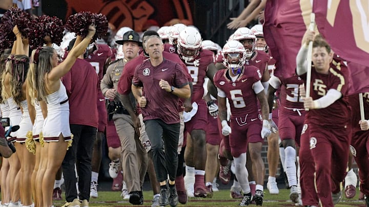 Sep 21, 2024; Tallahassee, Florida, USA; Florida State Seminoles head coach Mike Norvell leads his team out of the tunnel before the game against the California Golden Bears at Doak S. Campbell Stadium. Mandatory Credit: Melina Myers-Imagn Images
