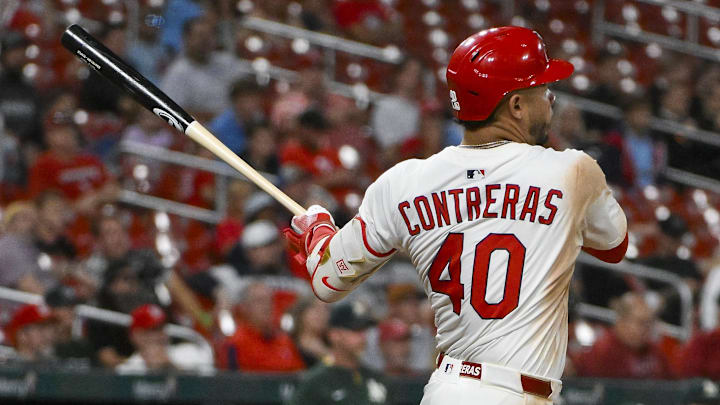 Sep 3, 2025; St. Louis, Missouri, USA;  St. Louis Cardinals first baseman Willson Contreras (40) hits a two run triple against the Athletics during the eighth inning at Busch Stadium. Mandatory Credit: Jeff Curry-Imagn Images