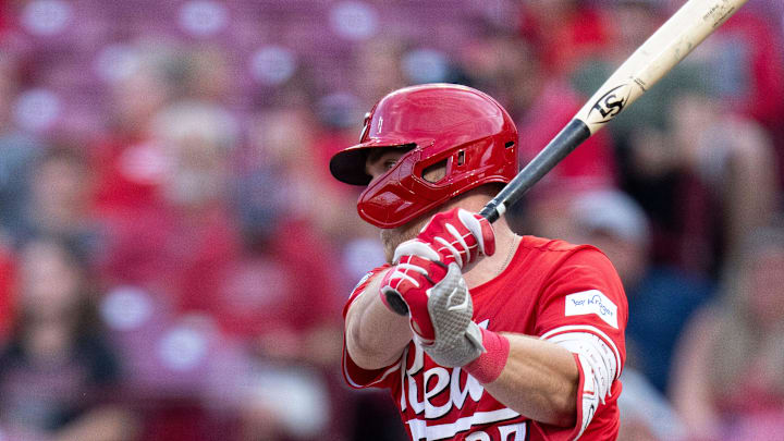 Cincinnati Reds catcher Tyler Stephenson (37) hits a base hit Scotia Cincinnati Reds second baseman Jonathan India (6) and Cincinnati Reds shortstop Elly De La Cruz (44) in the first inning of the MLB game between the Cincinnati Reds and Houston Astros at Great American Ball Park in Cincinnati on Wednesday, Sept. 4, 2024. Cincinnati Reds catcher Tyler Stephenson (37) hits a base hit Scotia Cincinnati Reds second baseman Jonathan India (6) and Cincinnati Reds shortstop Elly De La Cruz (44) in the first inning of the MLB game between the Cincinnati Reds and Houston Astros at Great American Ball Park in Cincinnati on Wednesday, Sept. 4, 2024.