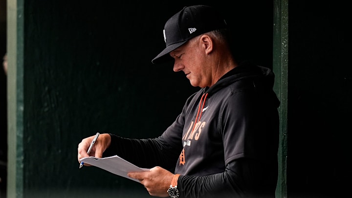 Detroit Tigers manager A.J. Hinch (14) looks on from the dugout. 