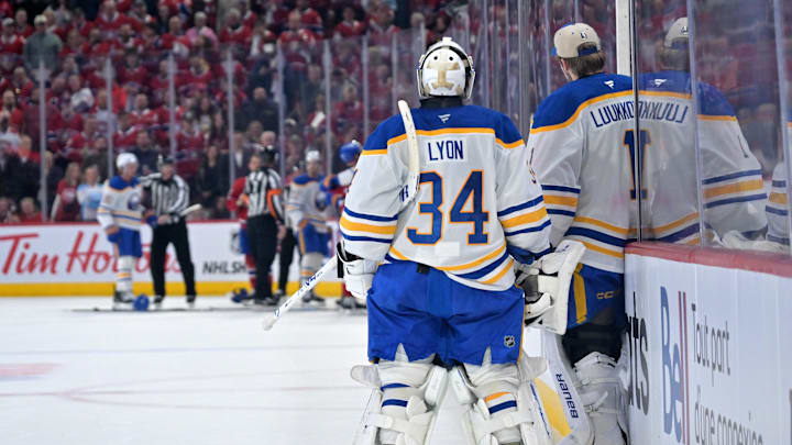 May 10, 2026; Montreal, Quebec, CAN; Buffalo Sabres goalie Alex Lyon (34) and teammate goalie Ukko-Pekka Luukkonen (1) watch the post period shoving during the first period in game three of the second round of the 2026 Stanley Cup Playoffs at the Bell Centre. Mandatory Credit: Eric Bolte-Imagn Images