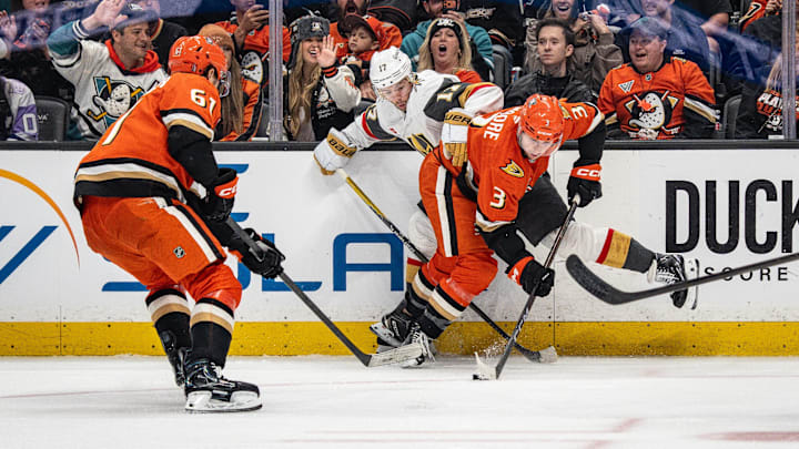 May 10, 2026; Anaheim, California, USA; Anaheim Ducks defenseman Ian Moore (3) and Vegas Golden Knights defenseman Ben Hutton (17) contend for the puck during the third period in game four of the second round of the 2026 Stanley Cup Playoffs at Honda Center. Mandatory Credit: Corinne Votaw-Imagn Images May 10, 2026; Anaheim, California, USA; Anaheim Ducks defenseman Ian Moore (3) and Vegas Golden Knights defenseman Ben Hutton (17) contend for the puck during the third period in game four of the second round of the 2026 Stanley Cup Playoffs at Honda Center. Mandatory Credit: Corinne Votaw-Imagn Images