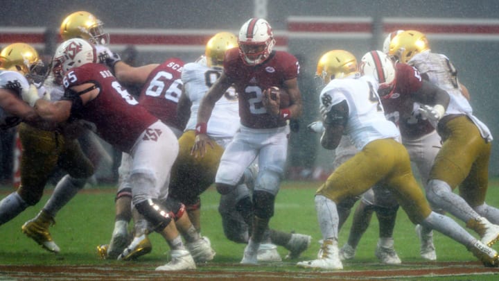 Oct 8, 2016; Raleigh, NC, USA;  North Carolina State Wolfpack quarterback Jalan McClendon (2) runs the ball during the second half against the Notre Dame Fighting Irish at Carter Finley Stadium. The Wolfpack won 10-3. 