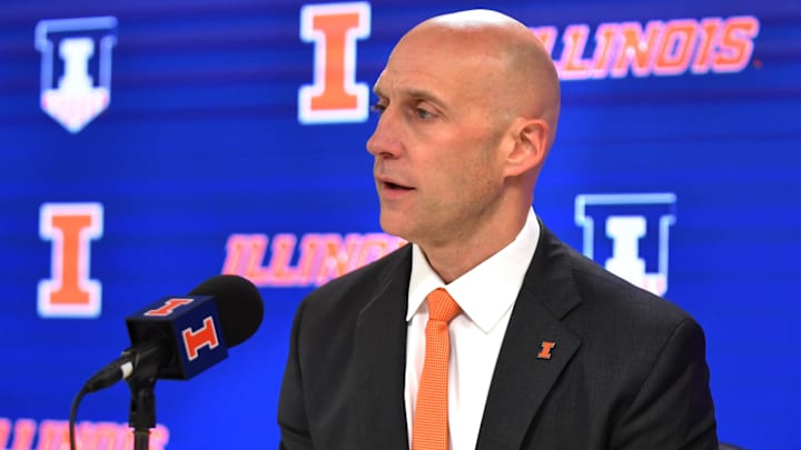 Dec 29, 2023; Champaign, Illinois, USA; Josh Whitman, Director of Athletics at the University of Illinois, addresses the media over the suspension of player Terrence Shannon Jr. after a rape charge on Dec.5. The address to the media came  before a game with Fairleigh Dickinson at State Farm Center. Mandatory Credit: Ron Johnson-Imagn Images