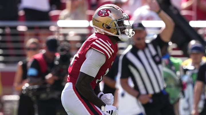 Oct 6, 2024; Santa Clara, California, USA; San Francisco 49ers wide receiver Brandon Aiyuk (11) reacts after catching a pass against the Arizona Cardinals during the second quarter at Levi's Stadium. Mandatory Credit: Darren Yamashita-Imagn Images