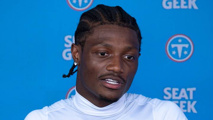 Tennessee Titans wide receiver Carnell Tate (14) fields questions from the media.