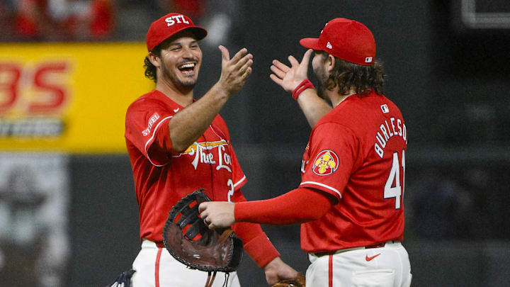 Sep 19, 2025; St. Louis, Missouri, USA; St. Louis Cardinals third baseman Nolan Arenado (28) celebrates with first baseman Alec Burleson (41) after the Cardinals defeated the Milwaukee Brewers at Busch Stadium. Mandatory Credit: Jeff Curry-Imagn Images Sep 19, 2025; St. Louis, Missouri, USA; St. Louis Cardinals third baseman Nolan Arenado (28) celebrates with first baseman Alec Burleson (41) after the Cardinals defeated the Milwaukee Brewers at Busch Stadium. Mandatory Credit: Jeff Curry-Imagn Images