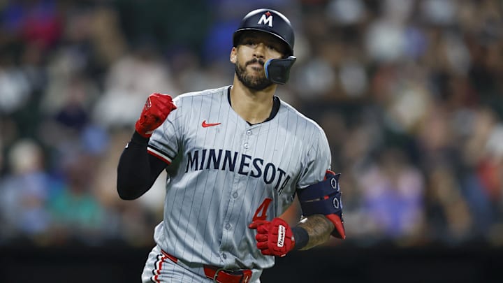 Minnesota Twins shortstop Carlos Correa (4) rounds the bases after hitting a solo home run against the Chicago White Sox during the seventh inning at Guaranteed Rate Field. Mandatory Credit: 