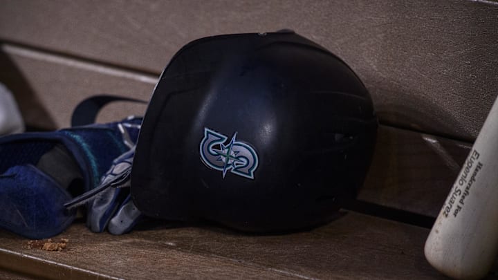 A view of a Seattle Mariners batting helmet and logo during the game between the Texas Rangers and the Seattle Mariners at Globe Life Field. A view of a Seattle Mariners batting helmet and logo during the game between the Texas Rangers and the Seattle Mariners at Globe Life Field.