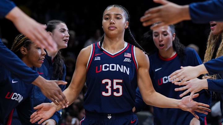 Nov 30, 2025; Cincinnati, Ohio, USA; UConn Huskies guard Azzi Fudd (35) takes the court during player introductions before the game against the Xavier Musketeers at the Cintas Center. Mandatory Credit: Aaron Doster-Imagn Images Nov 30, 2025; Cincinnati, Ohio, USA; UConn Huskies guard Azzi Fudd (35) takes the court during player introductions before the game against the Xavier Musketeers at the Cintas Center. Mandatory Credit: Aaron Doster-Imagn Images