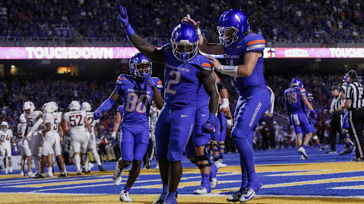 Boise State Broncos running back Ashton Jeanty (2) and quarterback Maddux Madsen celebrate. Boise State Broncos running back Ashton Jeanty (2) and quarterback Maddux Madsen celebrate.