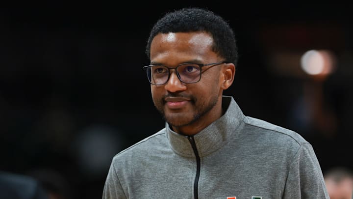 Nov 3, 2025; Coral Gables, Florida, USA; Miami Hurricanes head coach Jai Lucas looks on after the game against the Jacksonville Dolphins at Watsco Center. Mandatory Credit: Sam Navarro-Imagn Images