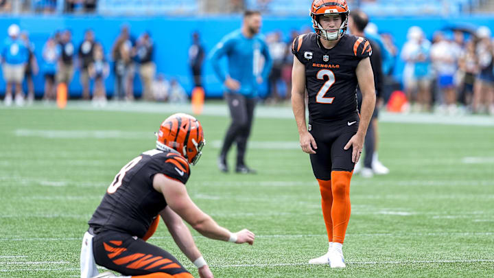 Sep 29, 2024; Charlotte, North Carolina, USA; Cincinnati Bengals place kicker Evan McPherson (2) and punter Ryan Rehkow (8) during pregame warm ups against the Carolina Panthers at Bank of America Stadium. Mandatory Credit: Jim Dedmon-Imagn Images