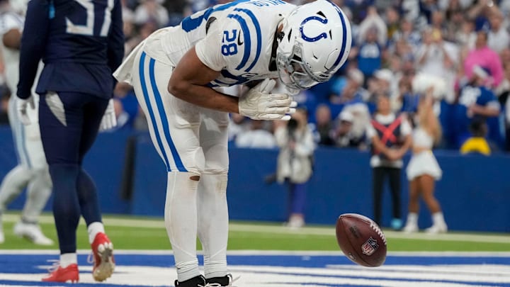 Indianapolis Colts running back Jonathan Taylor (28) celebrates after rushing for a touchdown Sunday, Dec. 22, 2024, during a game against the Tennessee Titans at Lucas Oil Stadium in Indianapolis.