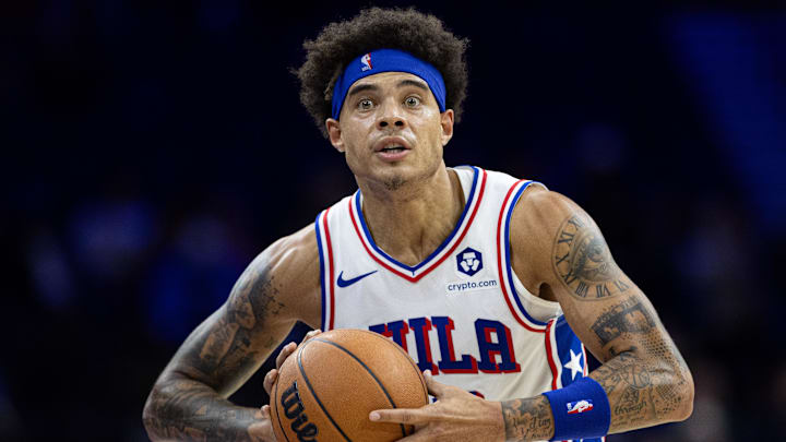 Oct 16, 2024; Philadelphia, Pennsylvania, USA; Philadelphia 76ers guard Lester Quinones (25) passes the ball against the Brooklyn Nets during the fourth quarter at Wells Fargo Center. Mandatory Credit: Bill Streicher-Imagn Images Oct 16, 2024; Philadelphia, Pennsylvania, USA; Philadelphia 76ers guard Lester Quinones (25) passes the ball against the Brooklyn Nets during the fourth quarter at Wells Fargo Center. Mandatory Credit: Bill Streicher-Imagn Images